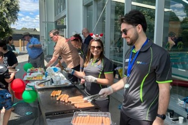 Image of people cooking on the bbq