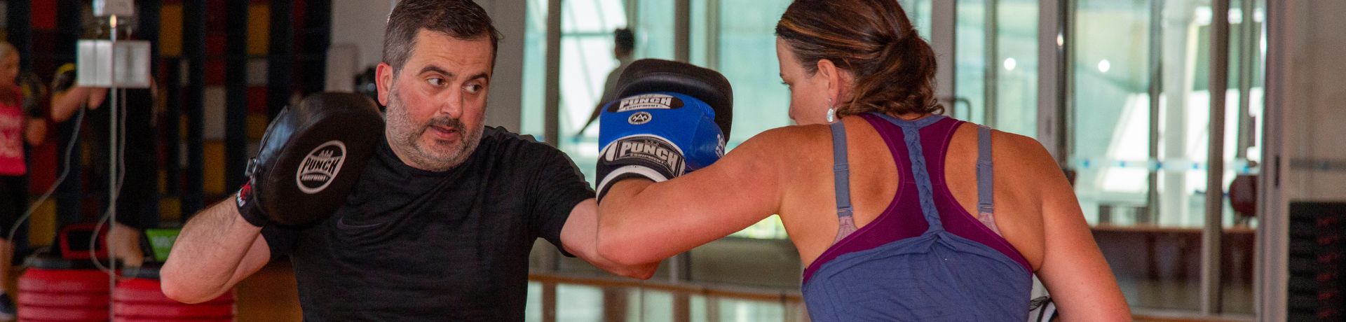 Fitness Plus members at a boxing class