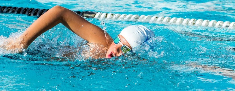 A young adult swimming