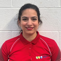 Personal Trainer Melika smiles at the camera